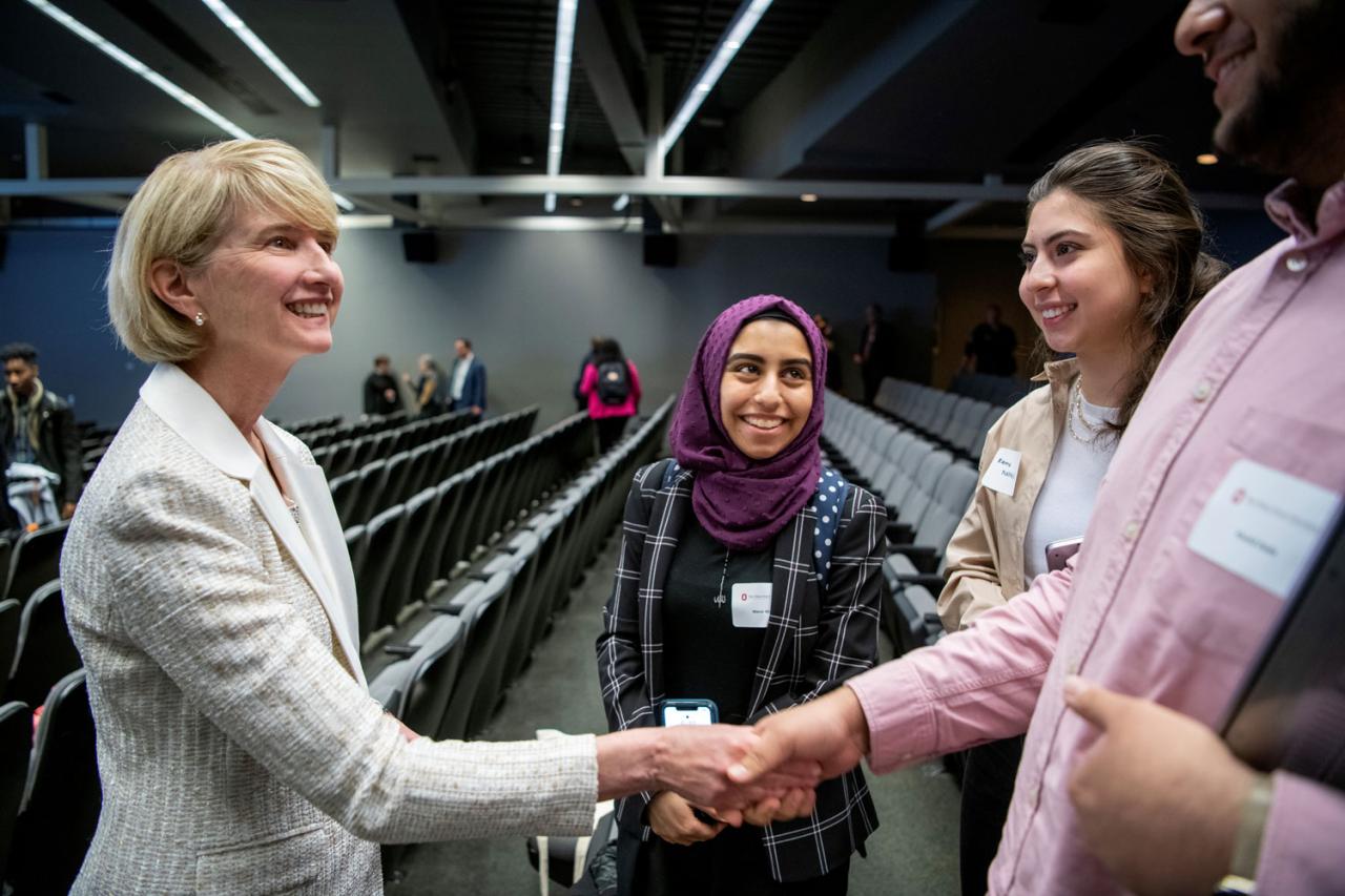 Image of President Johnson shaking hands with guests at the 2022 State of the University address