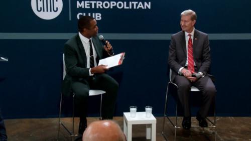 Matt Barnes and President Ted Carter talk onstage at a forum hosted by the Columbus Metropolitan Club