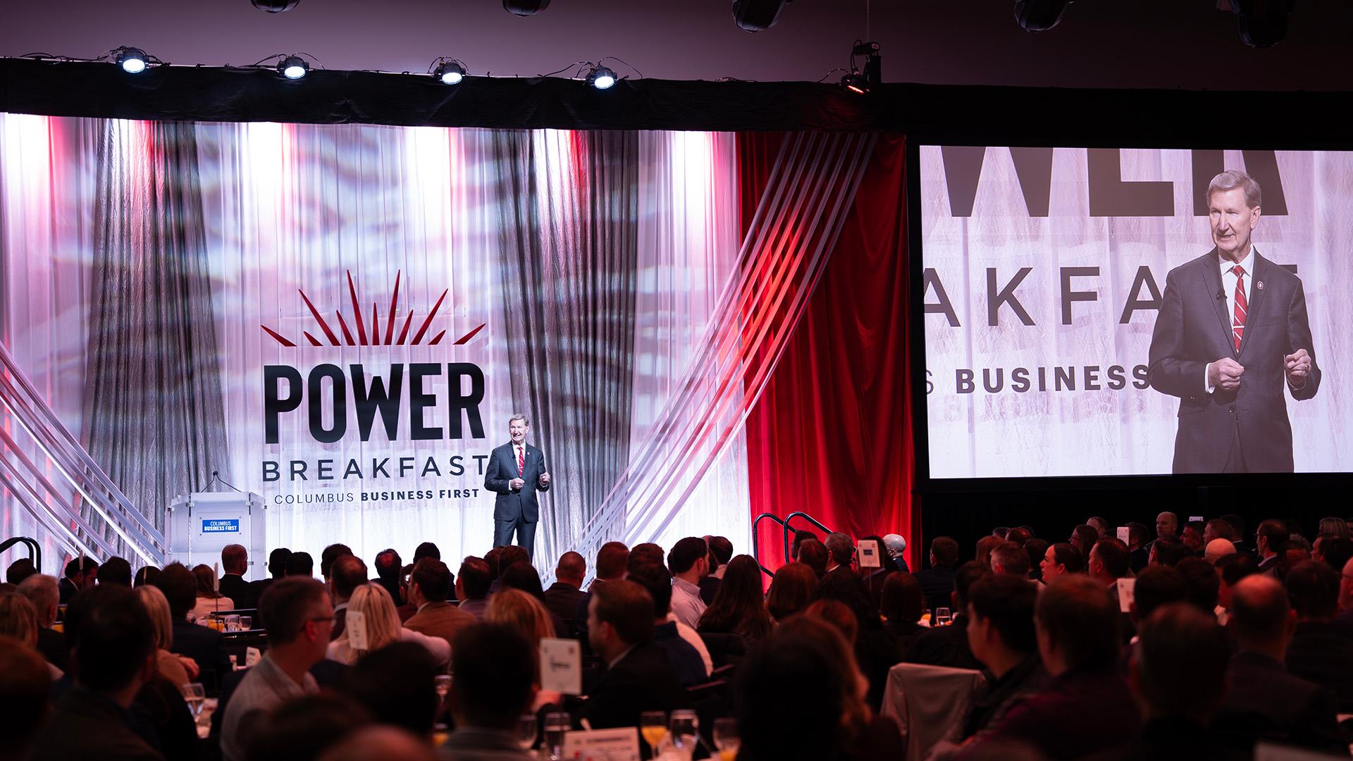 President Carter speaking at the Business First Power Breakfast