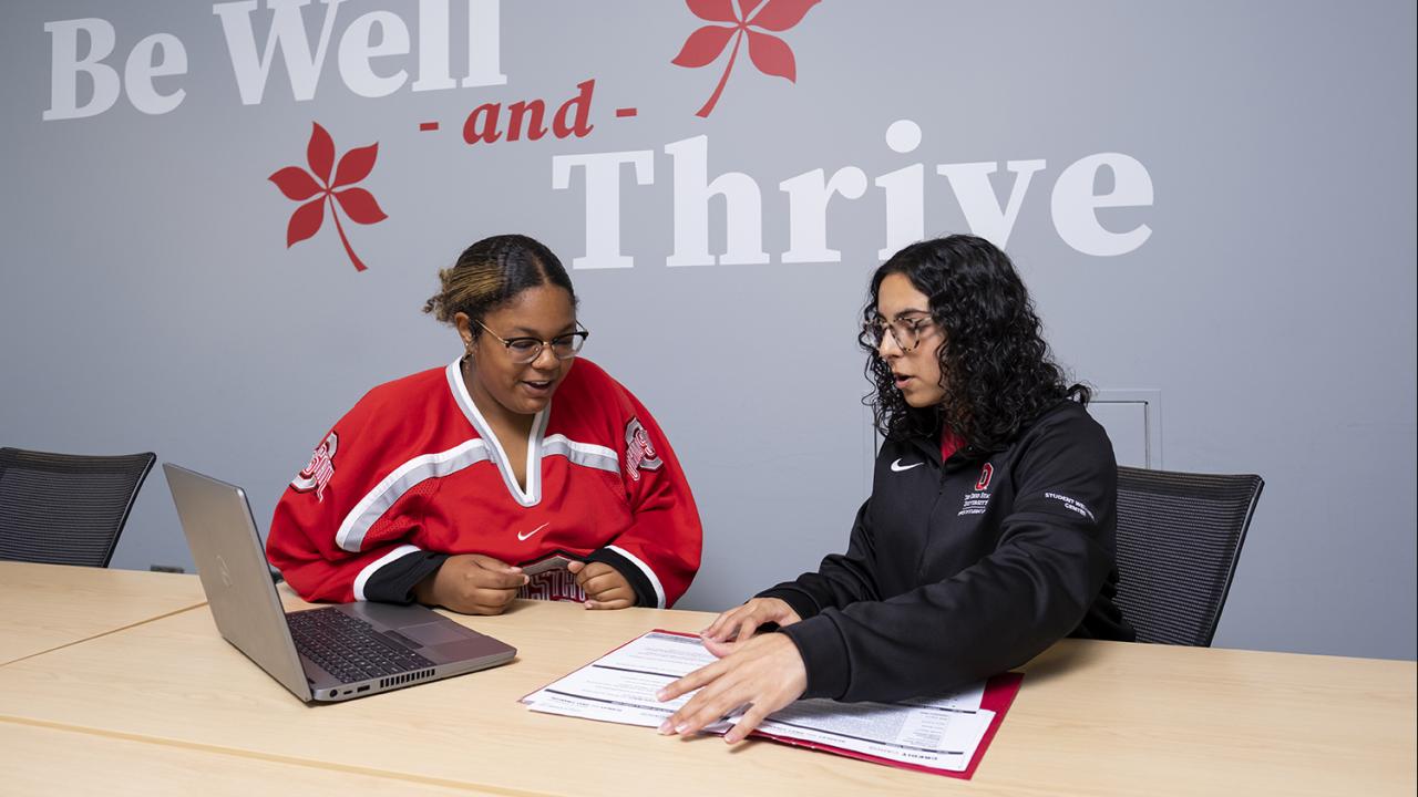 Two students work together as part of the Student Wellness Center