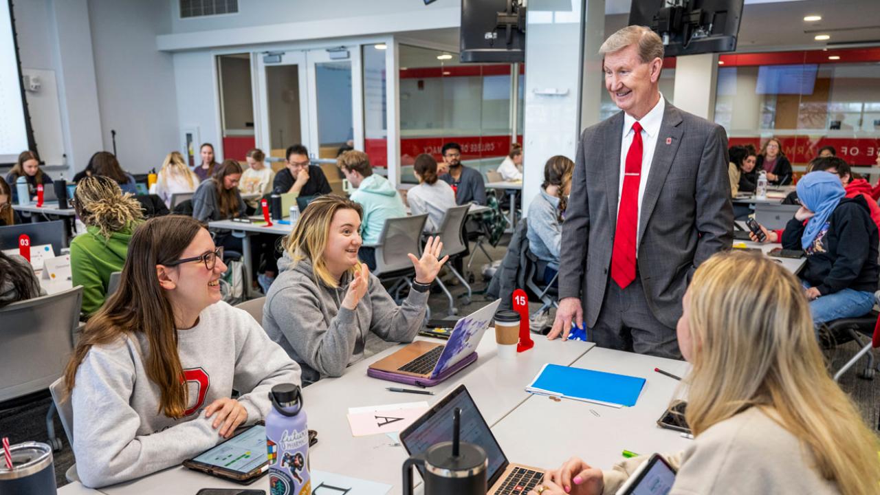 Ohio State President Ted Carter chatting with students