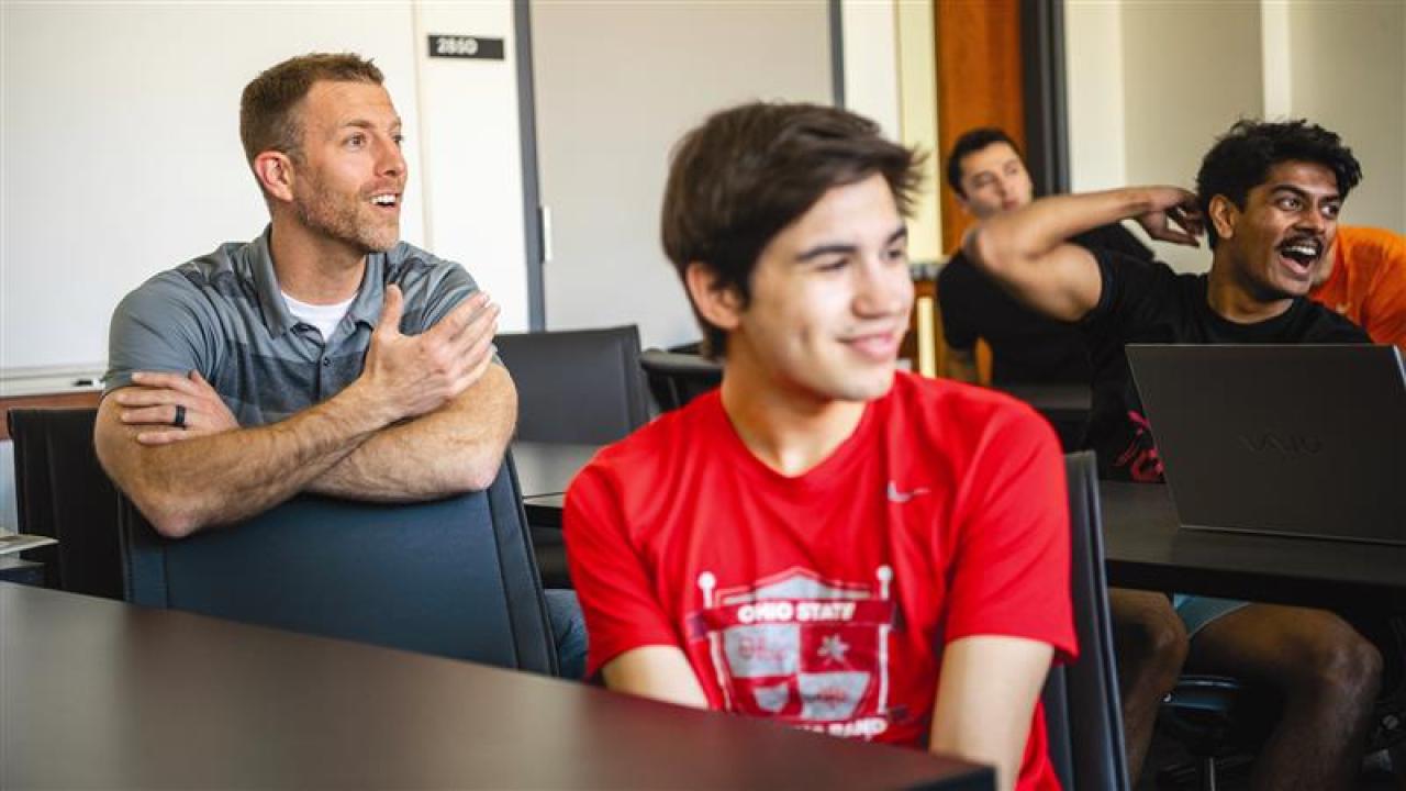 Students and faculty interacting in a classroom
